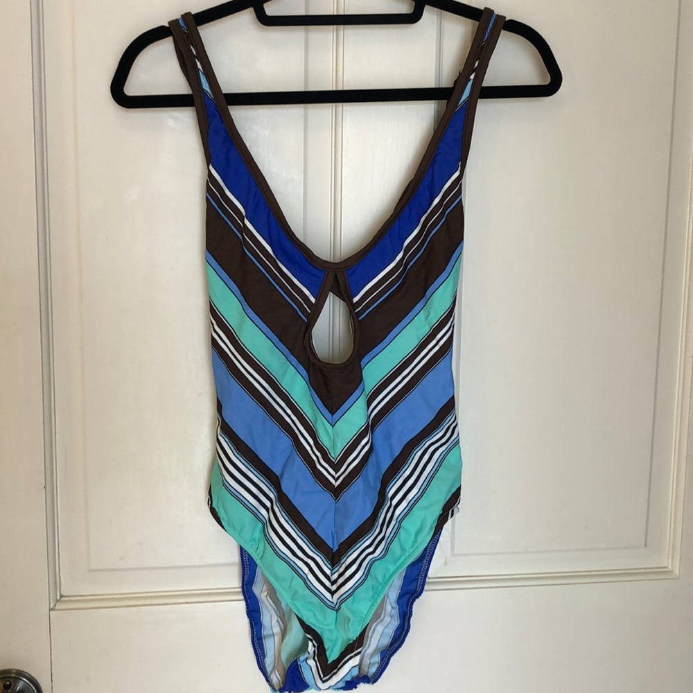 Swim suit with peek-a-boo in front and lower back